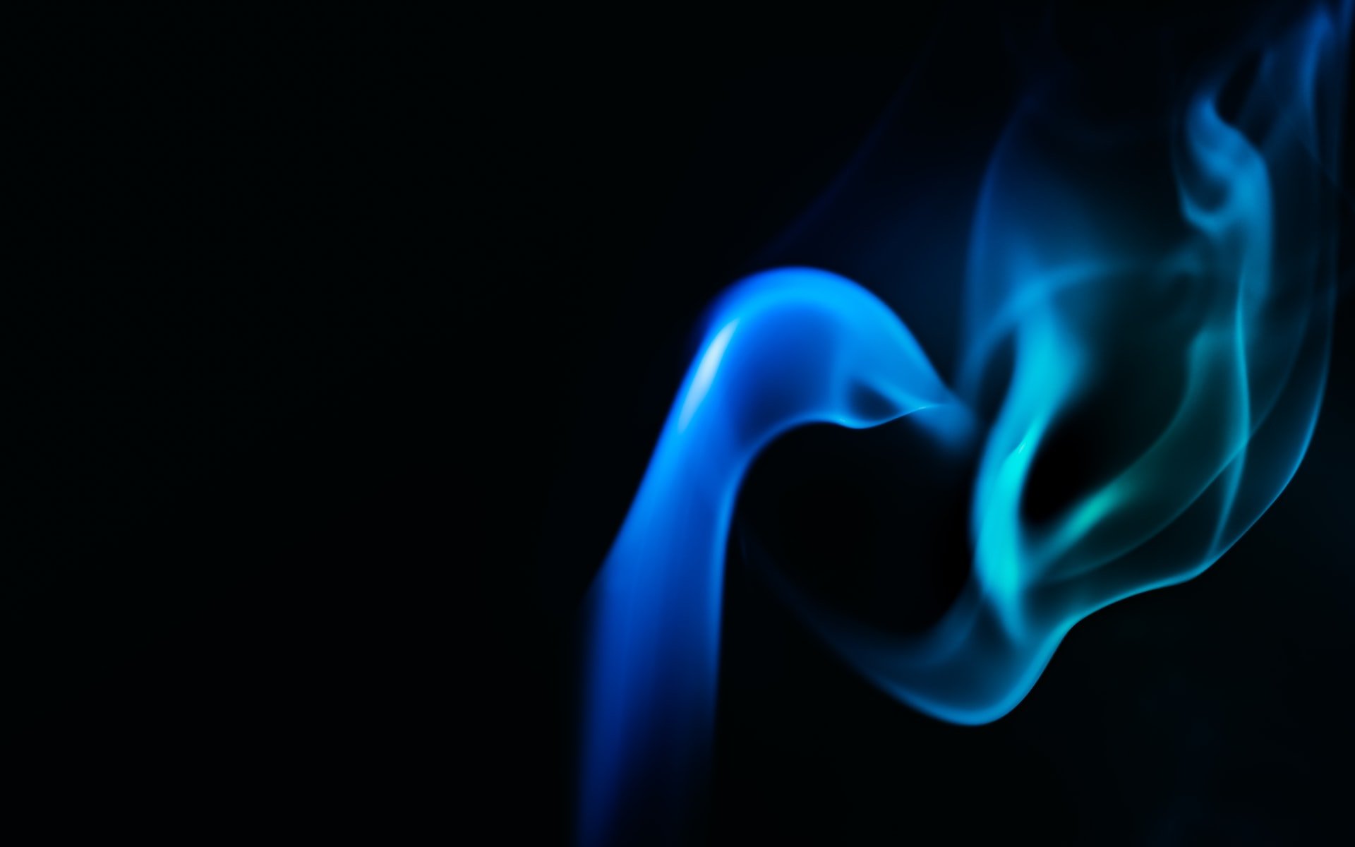 blue flame on black background